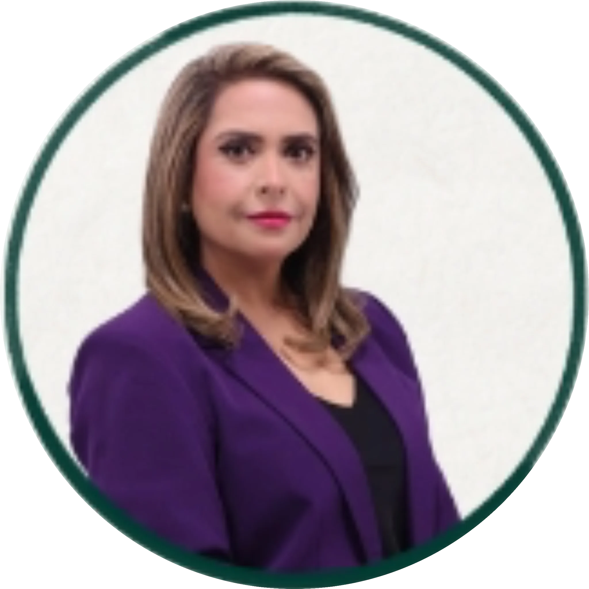 Professional headshot of a woman with shoulder-length brown hair wearing a purple blazer over a black top, on a white background in a circular frame