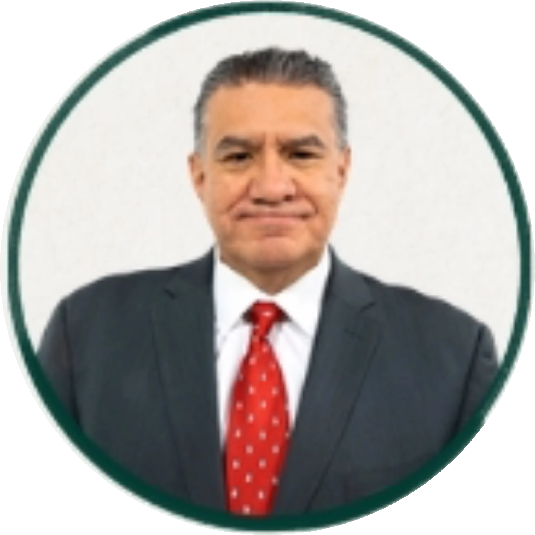 Professional headshot of a middle-aged man in a dark suit and red tie against a white background
